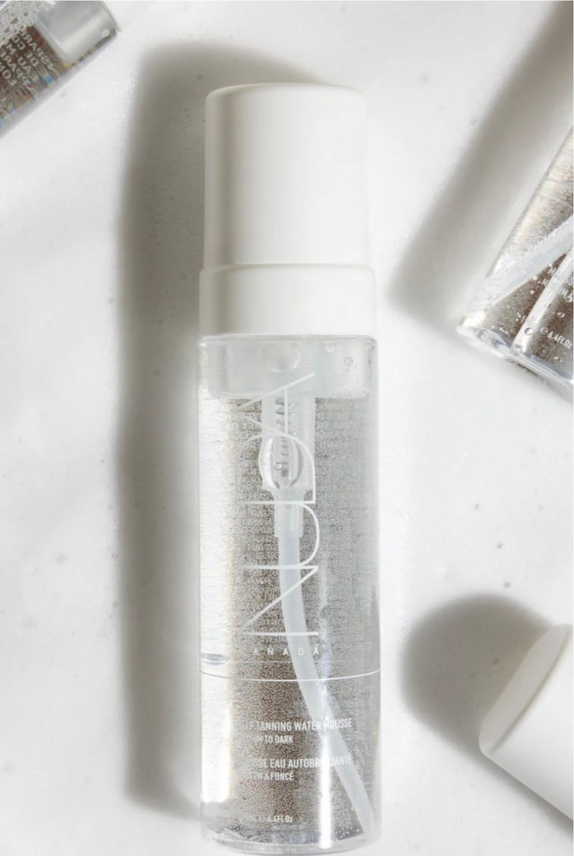 Eau mousse autobronzante-moyen à foncé